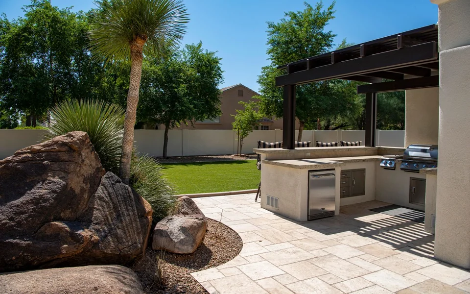 Completed outdoor living area with paved surfaces
